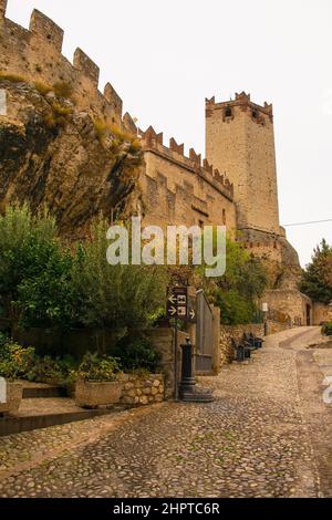 Malcesine, Italy - December 25 2022. The historic 13th century Scaliger Castle winter in the small town of Malcesine on the north shore of lake Garda Stock Photo