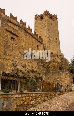 The historic 13th century Scaliger Castle winter in the small town of Malcesine on the north shore of lake Garda, Verona Province, Veneto, NE Italy Stock Photo