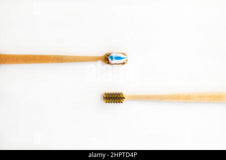 Top view of two toothbrushes for oral hygiene, toothpaste. Stock Photo