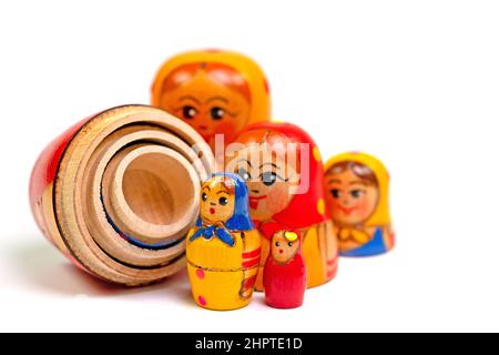 Matryoshka, hand-painted wooden dolls against a white background Stock Photo