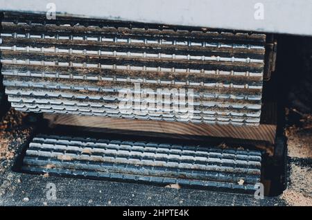 Industrial woodworking machinery processing timber and creating wood ...