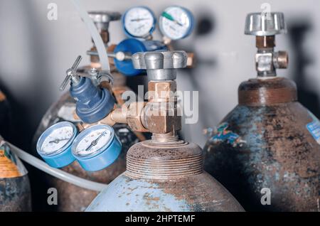 Gas cylinders for metal welding at  metalworking plant. Industrial production. Stock Photo