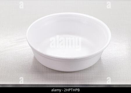 empty styrofoam lunch box mockup, on kitchen table, space for text, copy space, advertising use Stock Photo