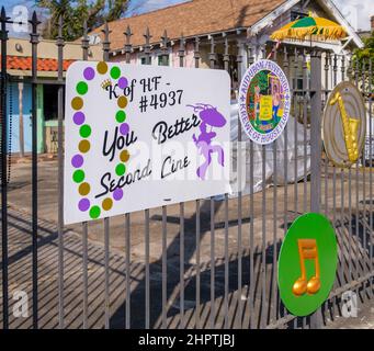 NEW ORLEANS, LA, USA - FEBRUARY 22, 2022: Front gate of Uptown home decorated for Mardi Gras Stock Photo