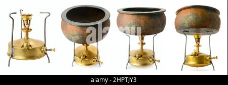 Old primus stove and clay pot from different angles isolated on white background. Stock Photo