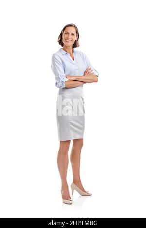 she dresses well She always dresses fashionably. Full length portrait of a well-dressed  mature woman posing in studio Stock Photo
