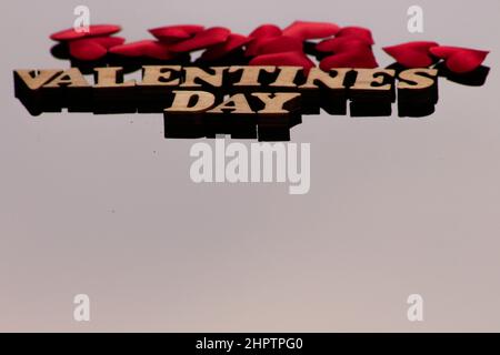 Valentines Day Background. Valentine's background with red hearts. Bright red hearts on a colorful background Stock Photo