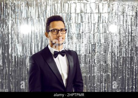 Portrait of African American man on disco background Stock Photo