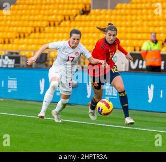 23rd February 2022 ;  Molineux Stadium, Wolverhampton,  West Midlands, England; Arnold Clark Womens International football Spain versus Canada;  Patricia Guijarro Gutierrez of Spain challenge for the ball with  Jessie Fleming of Canada Stock Photo