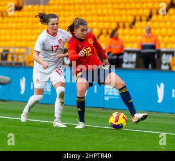 23rd February 2022 ;  Molineux Stadium, Wolverhampton,  West Midlands, England; Arnold Clark Womens International football Spain versus Canada;  Patricia Guijarro Gutierrez of Spain is under pressure from  Jessie Fleming of Canada Stock Photo