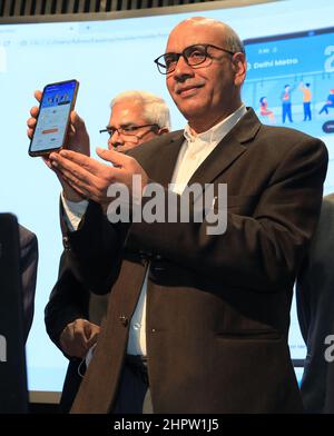 New Delhi, India. 23rd Feb, 2022. Delhi Metro Rail Corporation (DMRC), Managing Director, Mangu Singh holds a mobile phone during the launch of the revamped official website and Mobile application at Metro Bhawan.The new Website and Mobile application are loaded with many new advanced features such as interactive route maps, advanced station search options, real time first and last train time calculator, next and nearest station alert on the app etc. (Photo by Naveen Sharma/SOPA Images/Sipa USA) Credit: Sipa USA/Alamy Live News Stock Photo