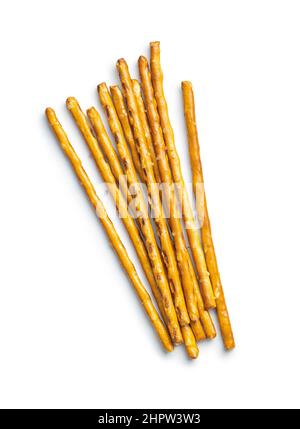 Salted sticks. Crispy pretzel sticks isolated on a white background. Stock Photo