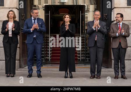 Madrid, Spain. 23rd Feb, 2022. (L-R) The Minister of Environment, Housing and Agriculture, Paloma Martin; the Minister of the Presidency, Justice and Interior, Enrique Lopez; the Minister of Education, Universities, Science and Government Spokesman, Enrique Ossorio and the Minister of Economy, Finance and Employment, Javier Fernandez-Lasquetty, applaud during a minute of silence in tribute to the deceased sailors of the 'Villa de Pitanxo' boat that sank in the north-east coast of Canada at the Real Casa de Correos in Madrid. Credit: SOPA Images Limited/Alamy Live News Stock Photo