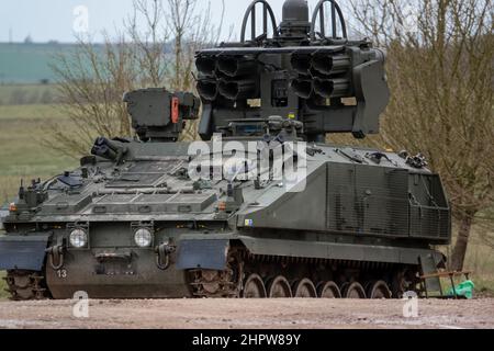 British Army Alvis Starstreak Stormer CVRT tracked armoured vehicle on military exercise, equipped with the short range HVM air defense missile system Stock Photo