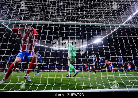 Atletico Madrid's Marcos Llorente reacts after missed to score a goal during the Champions League, round of 16, first leg soccer match between Atletico Madrid and Manchester United at the Wanda Metropolitano stadium in Madrid, Spain, Wednesday, Feb. 23, 2022. (AP Photo/Manu Fernandez) Stock Photo