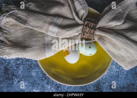Easter minimalistic place setting on concrete background Stock Photo