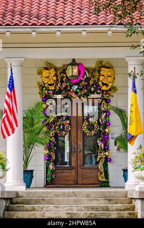 A Spanish-style home is decorated for Mardi Gras, Feb. 21, 2022, in Mobile, Alabama. Stock Photo