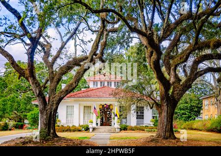 A Spanish-style home is decorated for Mardi Gras, Feb. 21, 2022, in Mobile, Alabama. Stock Photo