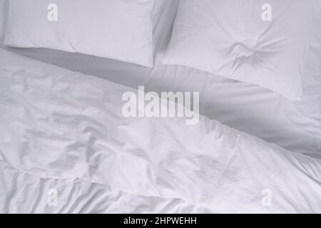 Top view of white bed with pillows Stock Photo