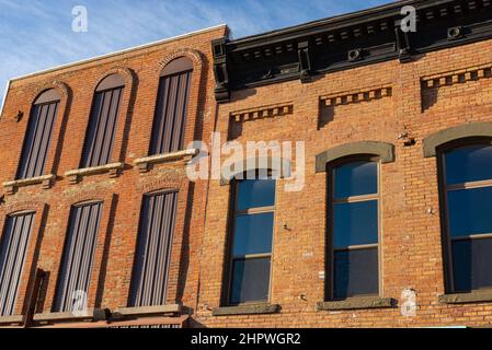 Old brick building in Midwest city on a beautiful sunny afternoon. Stock Photo