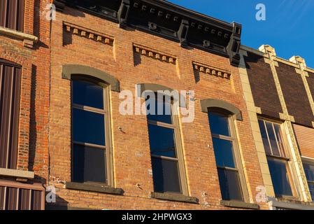 Old brick building in Midwest city on a beautiful sunny afternoon. Stock Photo