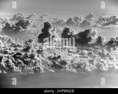 Cloud formation over the sea, thunderclouds, black and white photo, aerial view, Italy Stock Photo