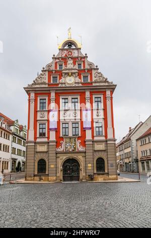 scenic view to old town hall of Gotha in Thuringia, Germany with famous facade in red. Stock Photo
