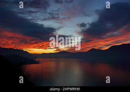 Sunset, clouds in the evening sky, sunset on Lake Maggiore, Luino, Lombardy, Italy Stock Photo