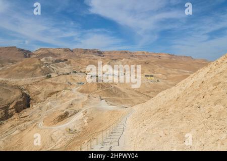 West view with Roman siege ramp, fortification, ruins of Masada, Israel Stock Photo