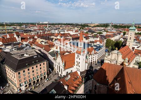Beautiful super wide-angle sunny aerial view of Munich, Bayern, Bavaria, Germany with skyline and scenery beyond the city, seen from the observation d Stock Photo