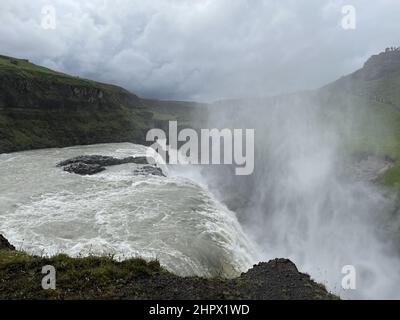 Beautiful view of a waterfall from a cliff under the clear sky Stock Photo