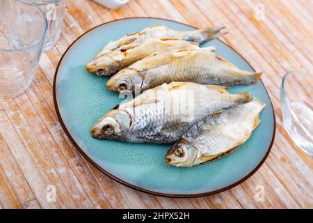 Dried roaches served on plate Stock Photo