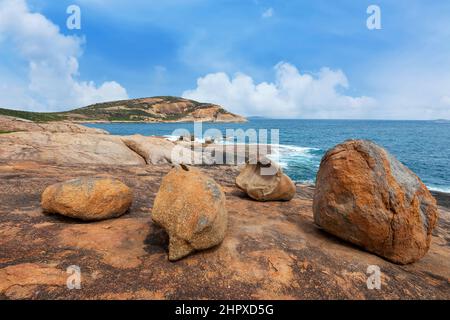 Scenic view of boulders along the picturesque coastline at Whistling Rock, a popular destination in Cape le Grand, near Esperance, Western Australia, Stock Photo