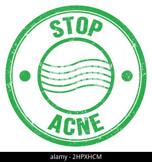 STOP ACNE text written on green round postal stamp sign Stock Photo