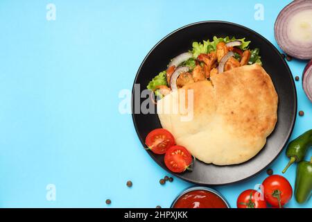 Concept of tasty food with pita with chicken meat Stock Photo