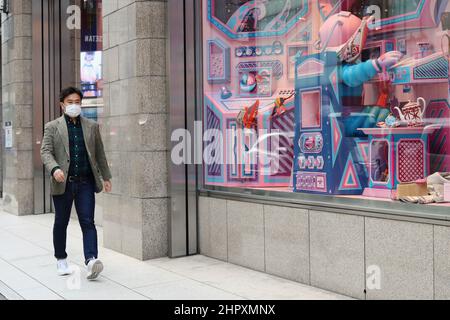 Street with window display in a Hermes store in Isetan department store in Tokyo's Shinjuku area. Stock Photo