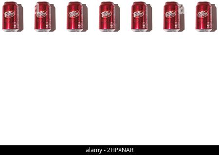 Dr. Pepper cans pattern on top, with hard shadow on white background. Stock Photo