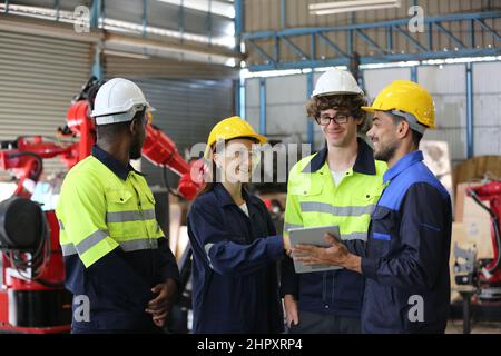 Factory Engineer Operating machines in industry factory. Stock Photo