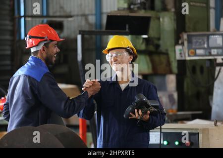 Professional men engineer worker skills quality, maintenance, training industry factory worker , warehouse Workshop for factory operators, mechanical Stock Photo