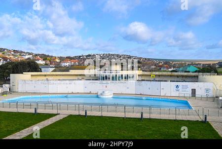 Saltdean Lido refurbished swimming pool with the Art Deco building designed by architect R.W.H. Jones still in need of work UK 2022 Stock Photo