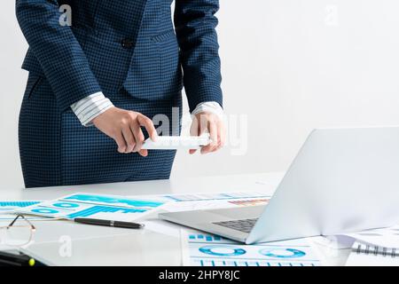 Businesswoman doing photo of document Stock Photo