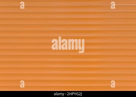 Orange Brown Horizontal Plastic Pattern Background Design Stripe Abstract Line Wall Surface. Stock Photo