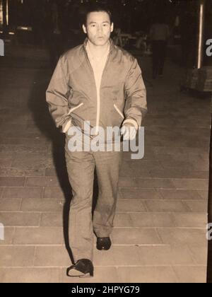 Vertical vintage photo of a stylish male on the streets of Oslo in 1963 Stock Photo