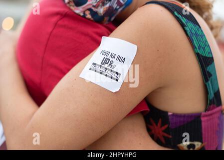 Closeup shot of stickers on a Brazilian's arm protesting President Jair Bolsonaro Stock Photo