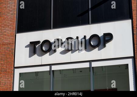 Belfast, UK- Feb 19, 2022: The sign for Topshop store in Belfast city centre. Stock Photo