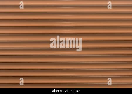 Orange Brown Horizontal Plastic Pattern Background Design Stripe Abstract Line Wall Surface. Stock Photo