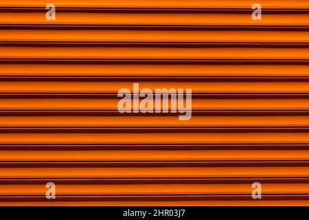 Orange Brown Horizontal Plastic Pattern Background Design Stripe Abstract Line Wall Surface. Stock Photo