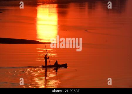 Fishermen at dawn in the Luangwa River, South Luangwa National Park, Zambia Stock Photo