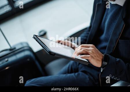 cropped image of a businessman with a digital tablet . Stock Photo