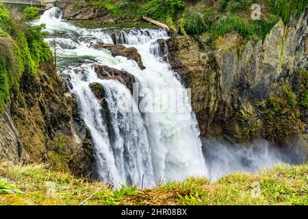 Roaring and misty Snoqualmie Falls in Washington State. Stock Photo